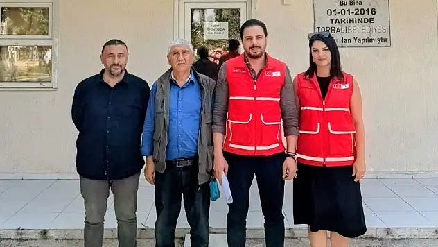 Atatürk Mahallesi'ndeki yangınzede aileye Torbalı Kızılay'dan yardım