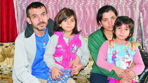 Yanginzede aile yaralarini sariyor